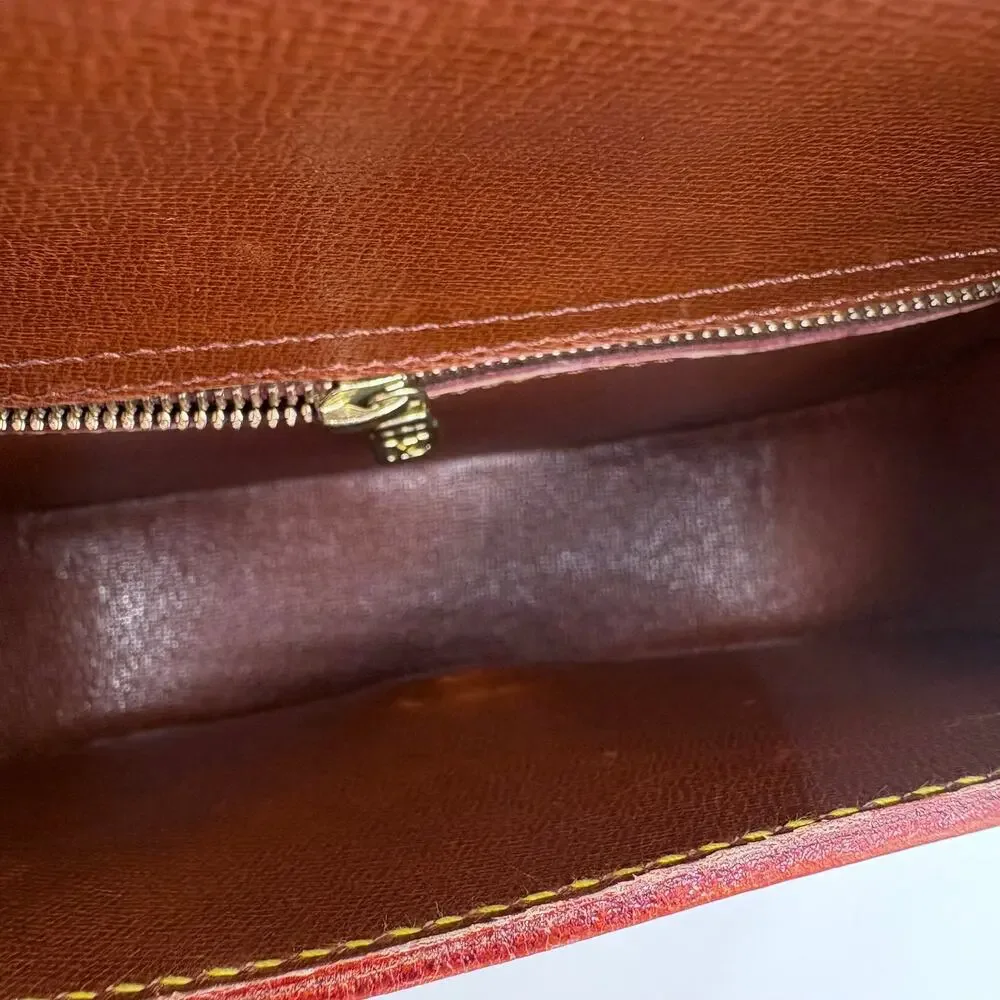 Authenticated Louis Vuitton Nomad Saint Cloud SM - Picture 8 of 9